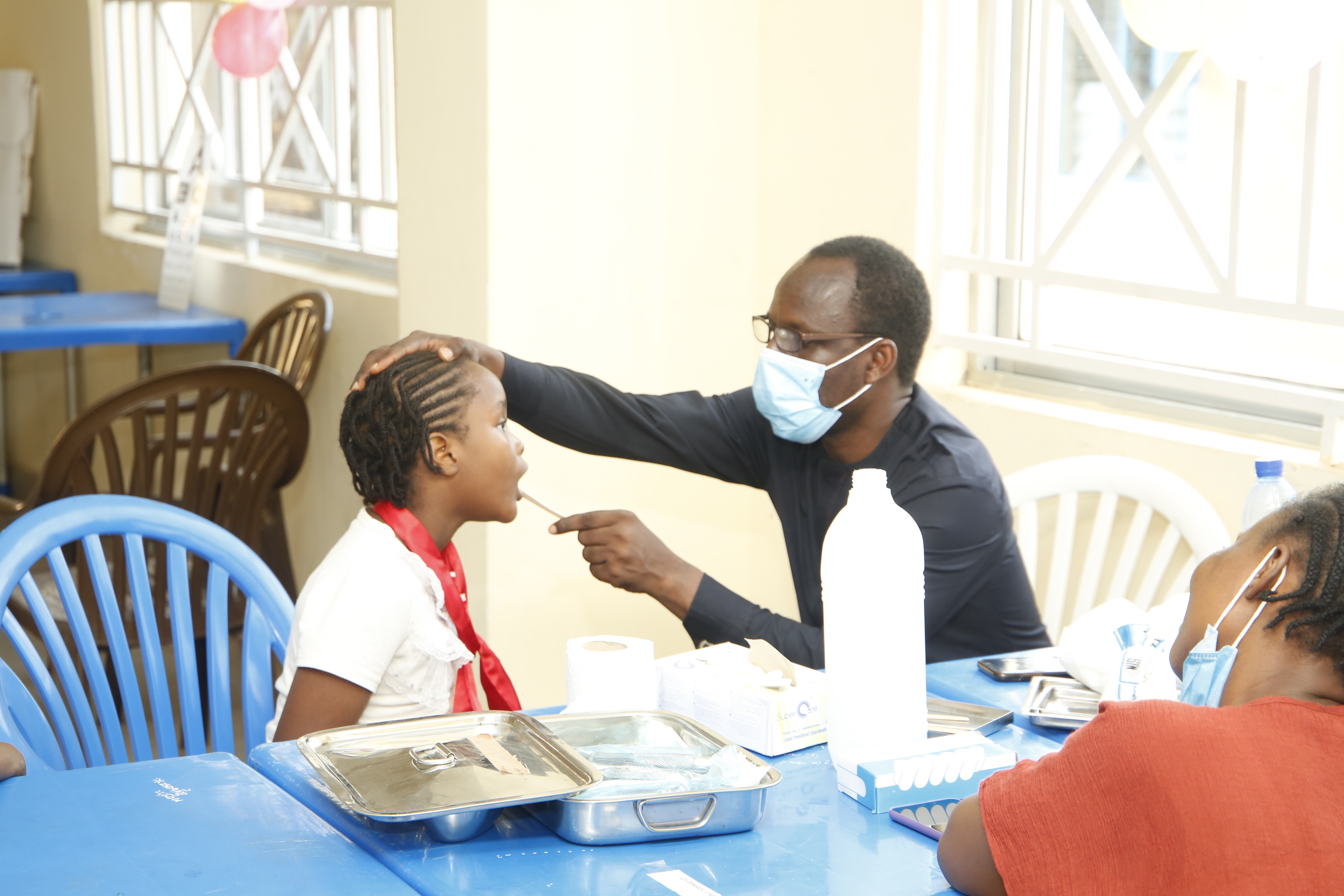 Children being examined by a Dentist