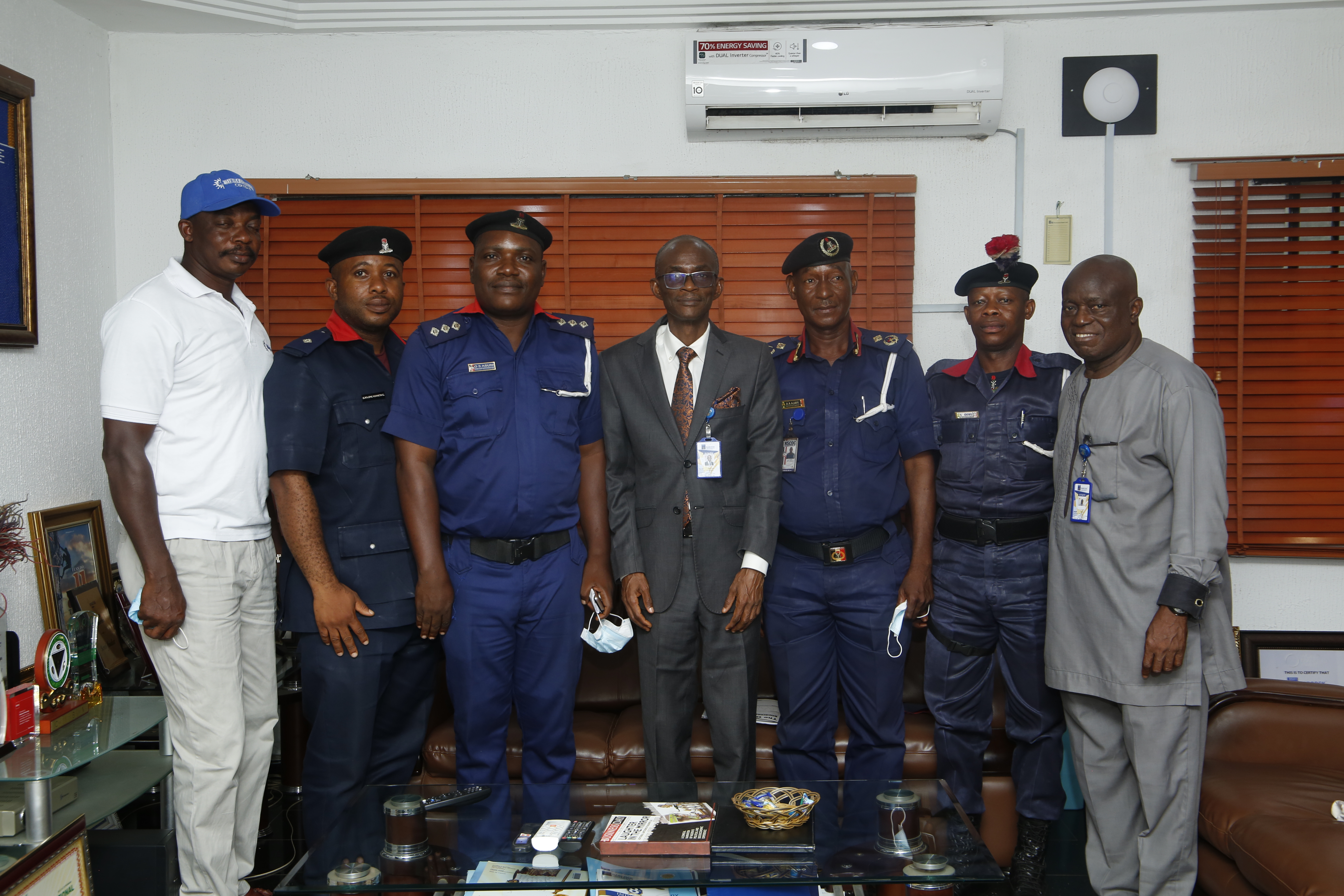 NSCDC Officers with Security Director of Babcock University